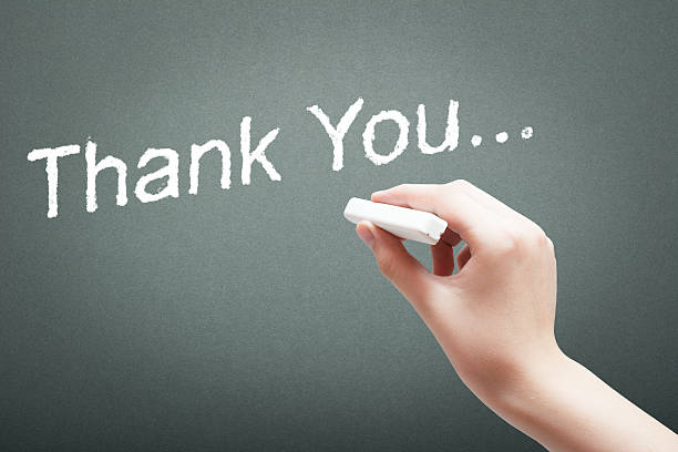 istock Hand writing with chalk thank you 508418490