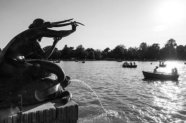 Warsaw, Poland - Aug 24, 2019: Sculpture on lake at Krasinski Palace Gardens - Warsaw, Poland