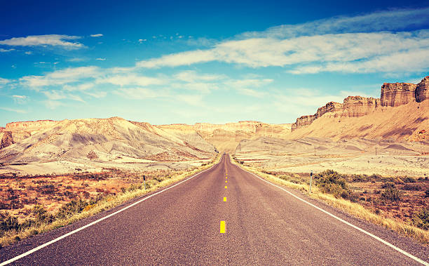 Vintage toned scenic road, Utah, USA.