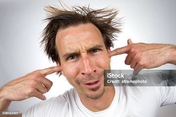 Fingers In Ears Stock Photo - Download Image Now - Hands Covering Ears, Listening, Adult