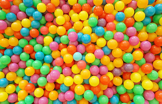 istock Many colour plastic balls for background 508422641