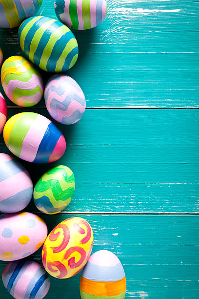istock Colorful easter eggs on turquoise wooden table 508423210
