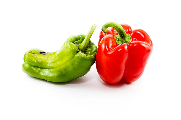 istock Fresh Green and Red Capsicum on white background 508423795
