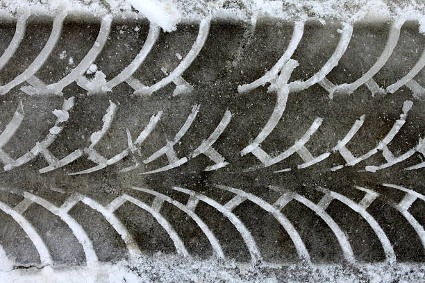 istock Car tracks in the snow 508424781
