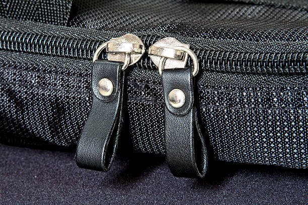 istock Metal zipper on black synthetic fabric 508427093