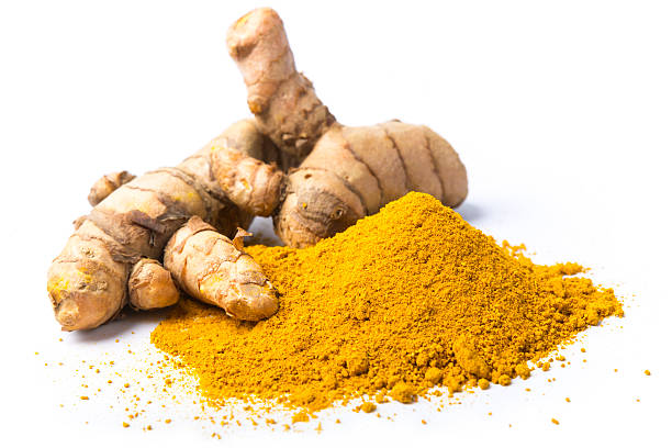 curcuma freschi isolati su bianco - curcumin foto e immagini stock