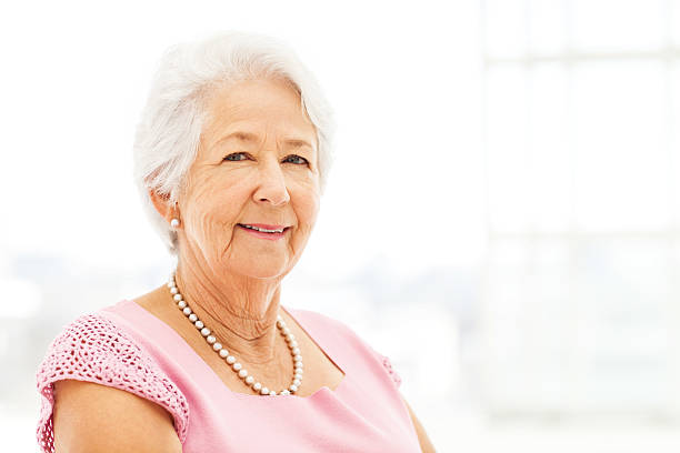 istock Senior Woman Smiling At Home 508428297