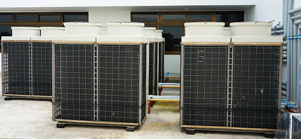 istock Row of air conditioning units on rooftop 508440707