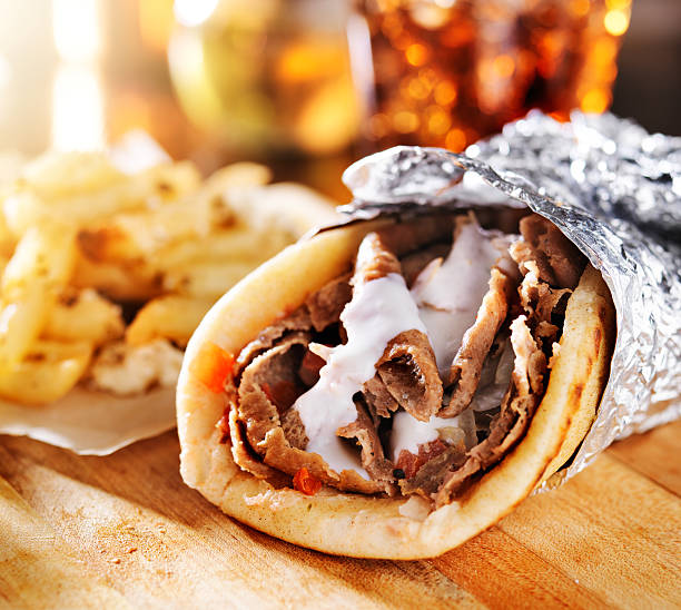 istock greek gyro with fries close up 508442575