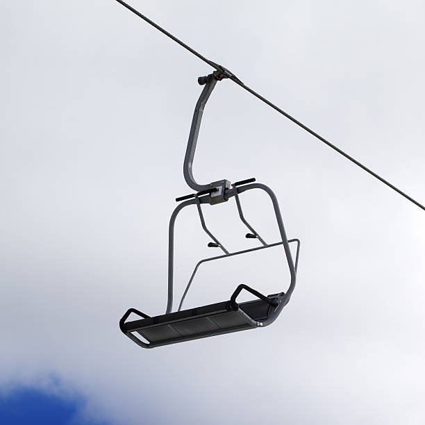 istock Chair-lift and cloudy sky 508446311