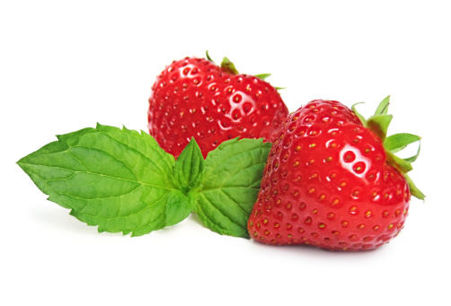 Strawberries and peppermint, isolated on white