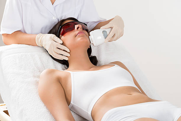 istock Beautician Giving Epilation Laser Treatment 508449780