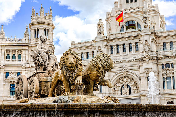 Cibeles fountain at Plaza de Cibeles in Madrid The Plaza de Cibeles is a square with a neo-classical complex of marble sculptures with fountains that has become an iconic symbol for the city of Madrid. madrid stock pictures, royalty-free photos & images