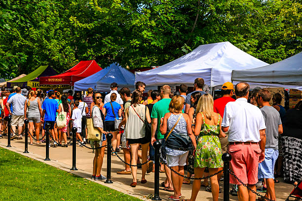 People at the Saturday Farmers Market in Madison Wisconsin Madison, WI, USA - August 1, 2015: Crowds of people at the Saturday Farmers Market in downtown Madison Wisconsin dane county stock pictures, royalty-free photos & images