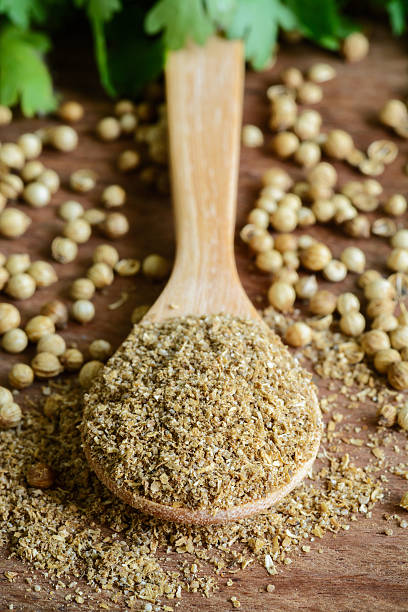 istock Coriander powder, Aromatic ingredients on rustic wooden table 508456326