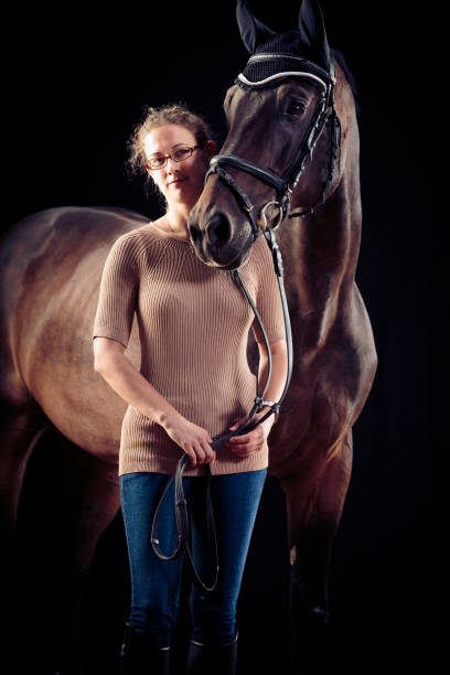 istock Woman With Her Horse 508457880