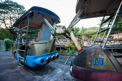 Derelict enterprise fairground ride at Yangon abandoned amusement park