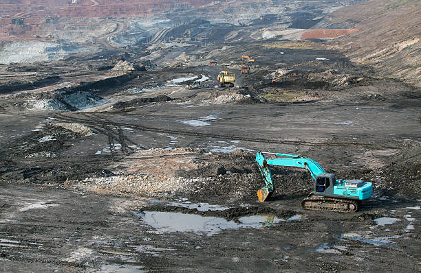 istock Part of a pit with big mining truck working 508459154