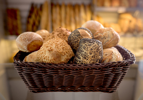 Fresh whole wheat bread in a basket at the bakery - baking concepts