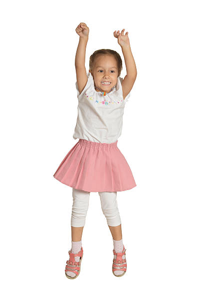 istock Cute little girl jumping 508459994