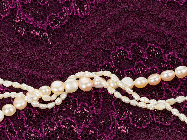 istock pearl beads on a lace cloth 508461156
