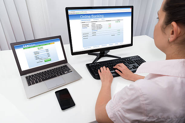 istock Businesswoman Doing Online Banking On Computer 508463820