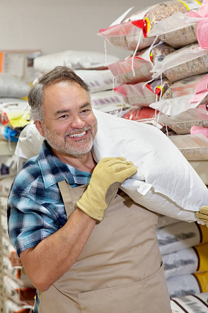 istock Happy mature man in feed store 508466991