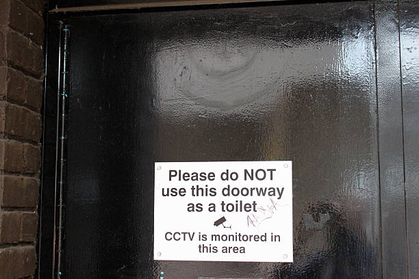 istock Funny sign: Please do not use doorway as a toilet 508467079