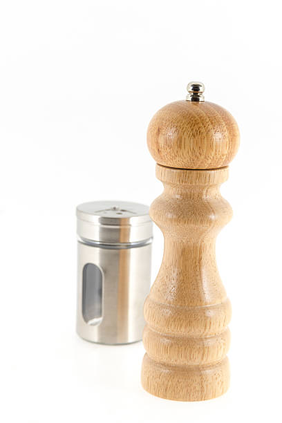 istock Salt and pepper grinders isolated on white background 508467675