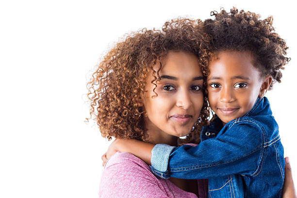 istock Pretty Ethiopian sisters hugging; isolated on white background 508471145