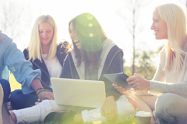 istock Close up of 3 girls using computers 508472799