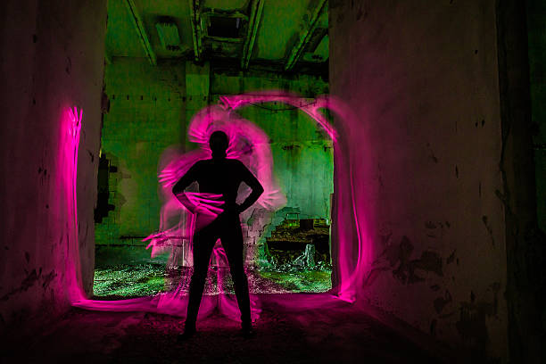 istock Monster's Claws Around Woman's Silhouette, Light Painting 508484020