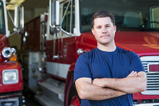 istock Fireman in front of fire truck 508484508