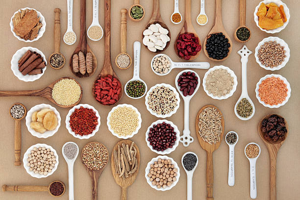 Superfood for Good Health Large superfood sampler for good health in spoons and bowl forming an abstract background. Highly nutritious in antioxidants, vitamins, minerals and dietary fiber. adzuki bean photos stock pictures, royalty-free photos & images