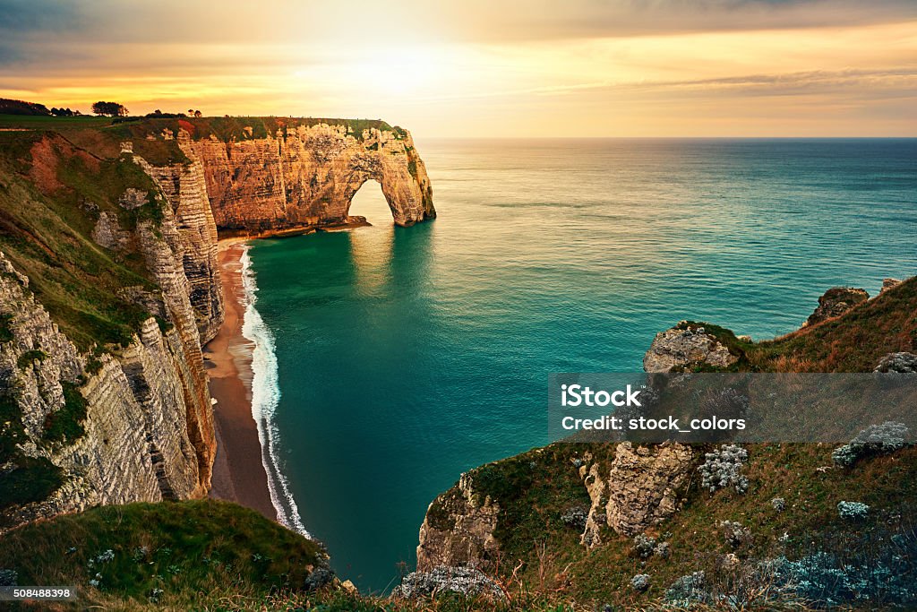 sunset in Etretat nature landscape in the sunset in Etretat, France in beautiful summer day. Normandy Stock Photo