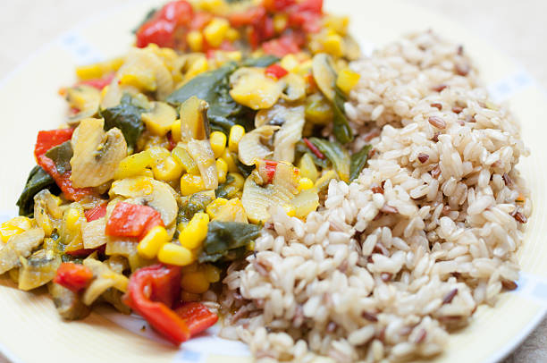 istock Risotto with peppers, spinach mushrooms and corn 508490048