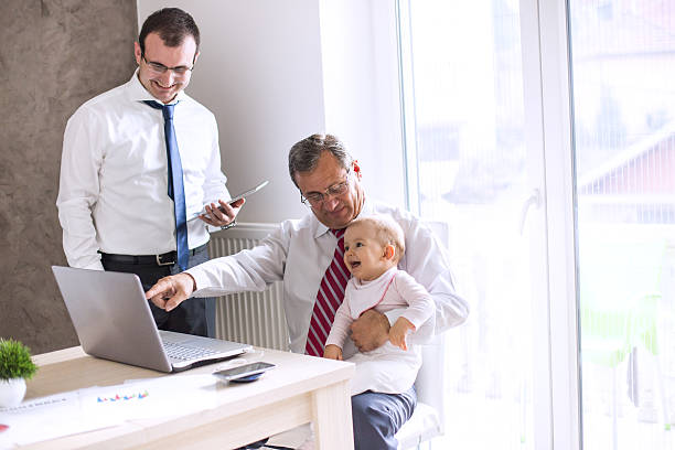 istock Laughing baby at the office 508490084