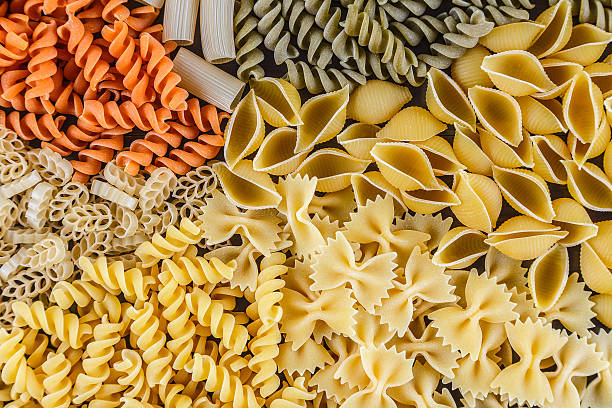 istock Mound of pasta on a white background close-up macro 508492154