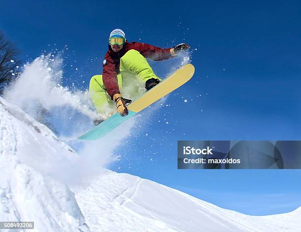 Snowboarder In The Sky Stock Photo - Download Image Now - Snowboarding, Jumping, Snowboard