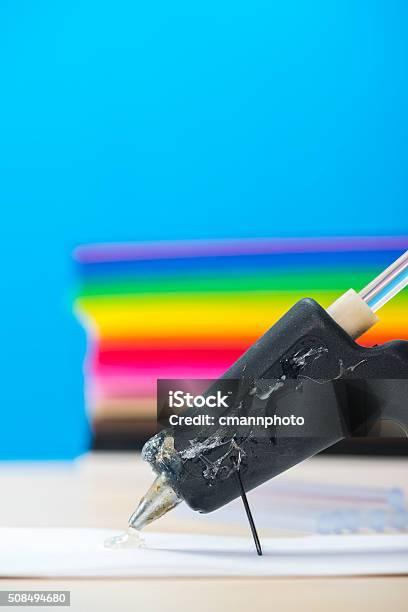 Hot Glue Gun And Sticks Used For Creating Different Crafts Stock Photo - Download Image Now