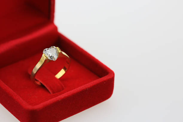 istock Wedding rings background, beautiful silver ring in red box 508496986