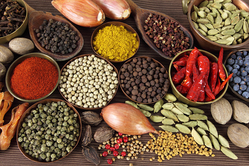 seasonings and spices for cooking on a table