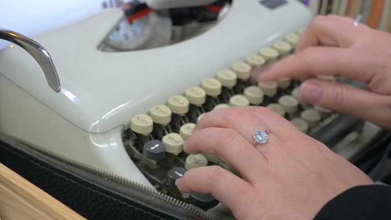 Two videos of typewriter in 4K