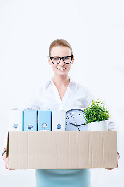 istock Pleasant woman holding box with things 508508570