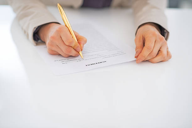istock closeup on business woman working with document 508509823