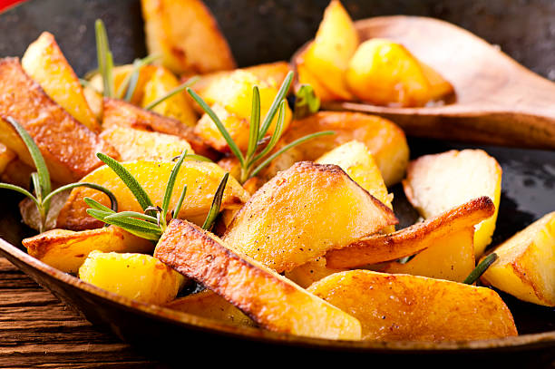 Fried Potatoes with Rosemary stock photo