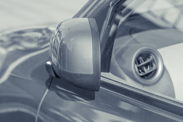 istock Side rear-view mirror closed for safety at car park 508510106