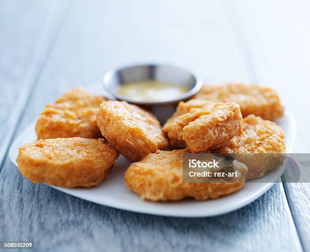 Chicken Nuggets With Honey Mustard In Natural Light Stock Photo - Download Image Now