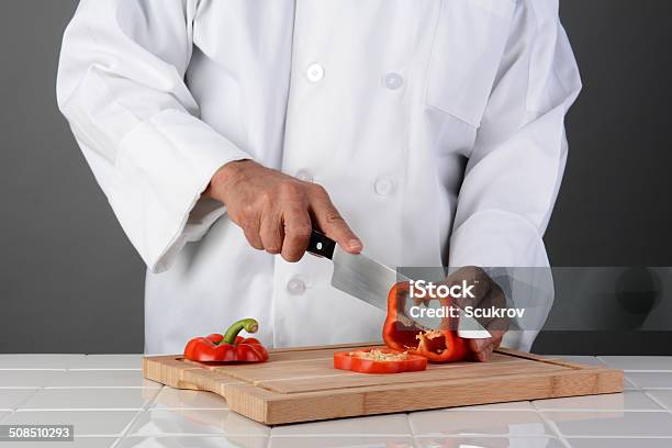 Chef Slicing Red Bell Pepper Stock Photo - Download Image Now - Adult, Adults Only, Bell Pepper