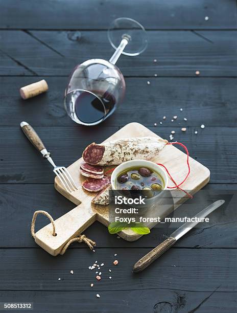 Wine Appetizer Set Glass Of Red Wine French Sausage And Stock Photo - Download Image Now